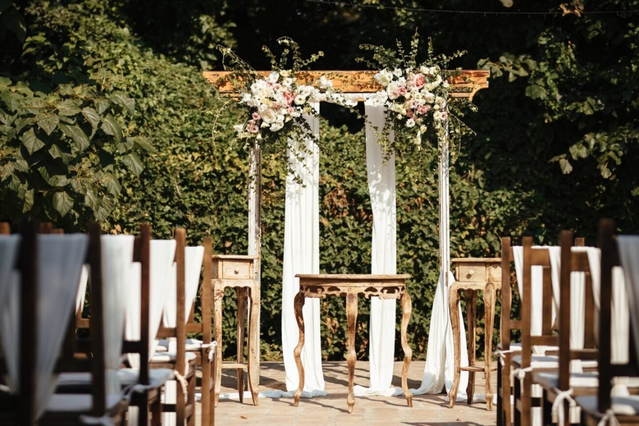Rustic wedding aisle in a garden.