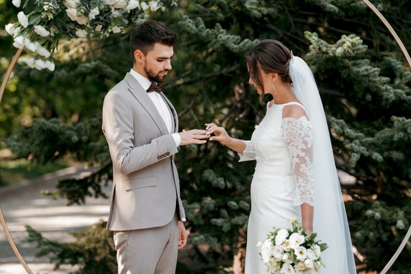 wedding ceremony of the newlyweds on the glade